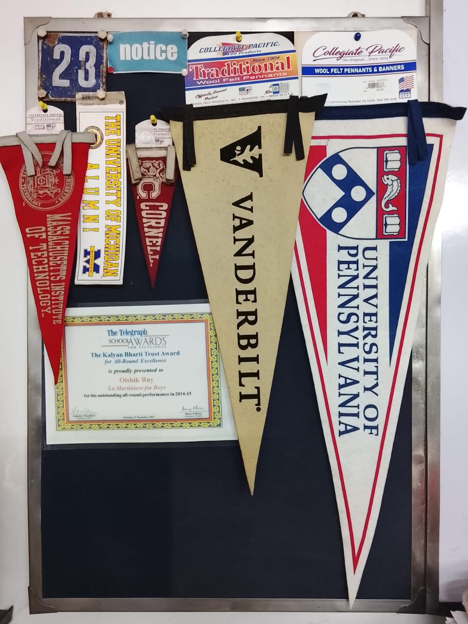 University pennants on the classroom wall at Millennium Mathematics